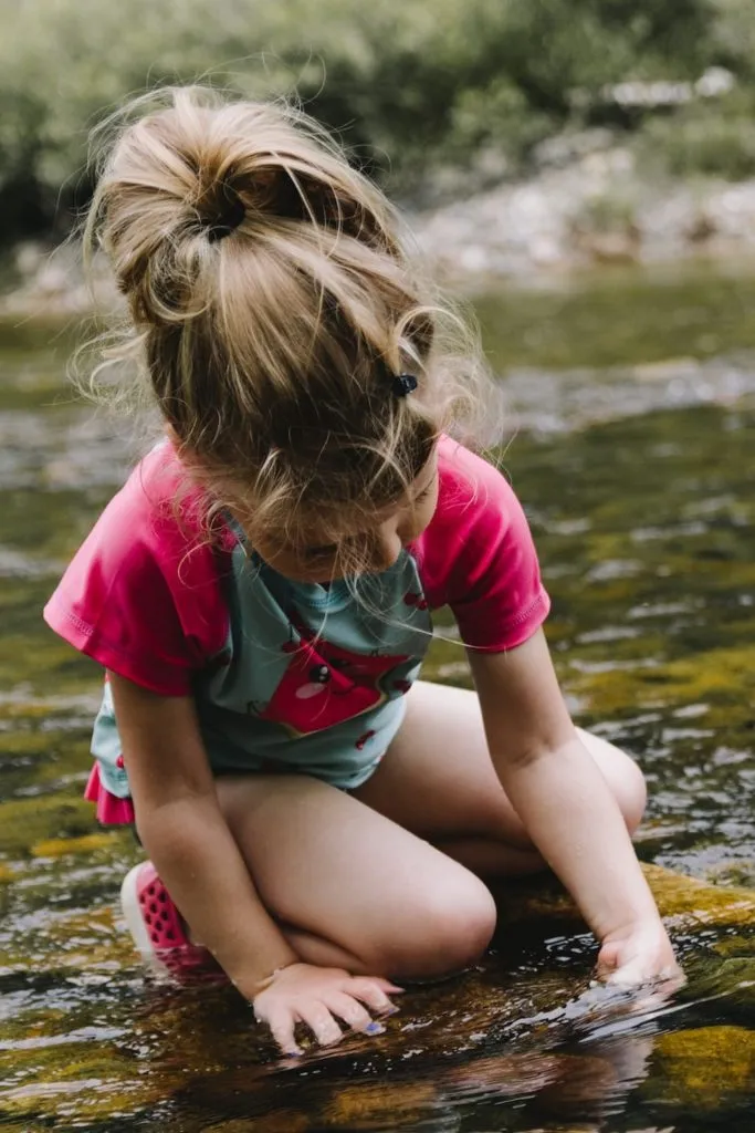 girl playing in stream hsa main